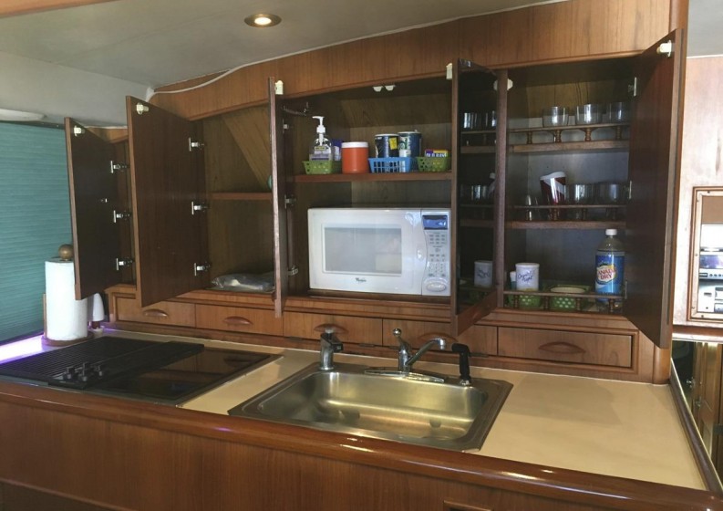 Arrowhead Yacht Photos Pics mirrored doors open above Galley sink