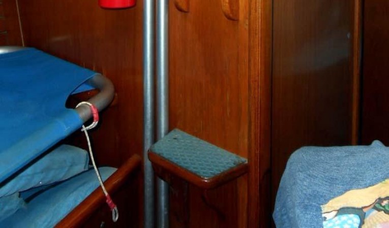 37 Nautor Swan steps in forepeak to foredeck hatch