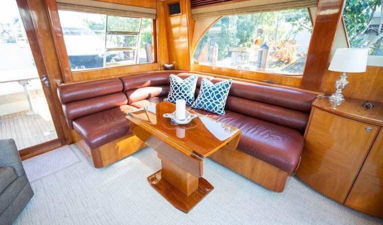 52 Midnight Lace Main Salon Port Couch and Dining Area