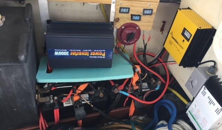 38 Beneteau Chargers and inverter located in the cockpit lazerette