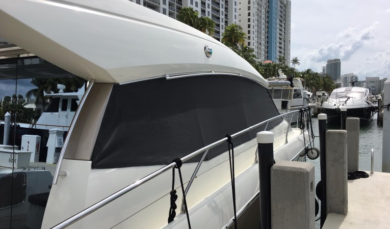 50 Prestige Stbd side window with brand new sun shade cover