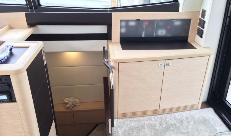 50 Prestige aft salon console / stairs to Master Cabin