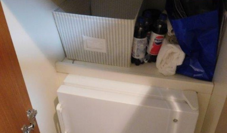 63 Ferretti Yachts Companionway Storage and Freezer