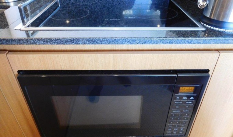 63 Ferretti Yachts Galley - Bosch Cooktop and Microwave