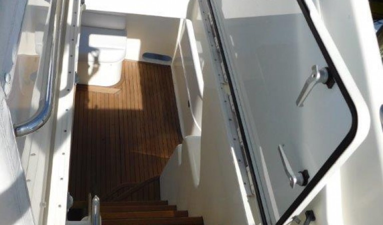 63 Ferretti Yachts Access Hatch to Aft Deck Stairs