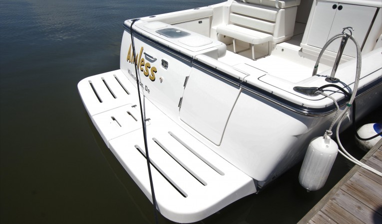32 Tiara swim platform with door to cockpit