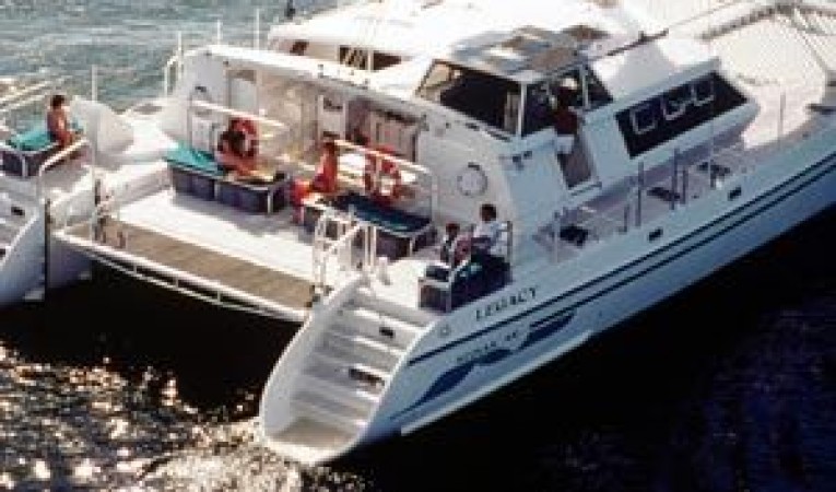 65 Woodwind Kurt Hughes Custom Catamaran Under Sail - Aft view