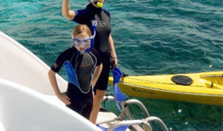 65 Woodwind Kurt Hughes Custom Catamaran Enjoying Water Sports