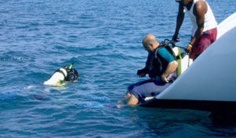 65 Woodwind Kurt Hughes Custom Catamaran Scuba Diving off Transom