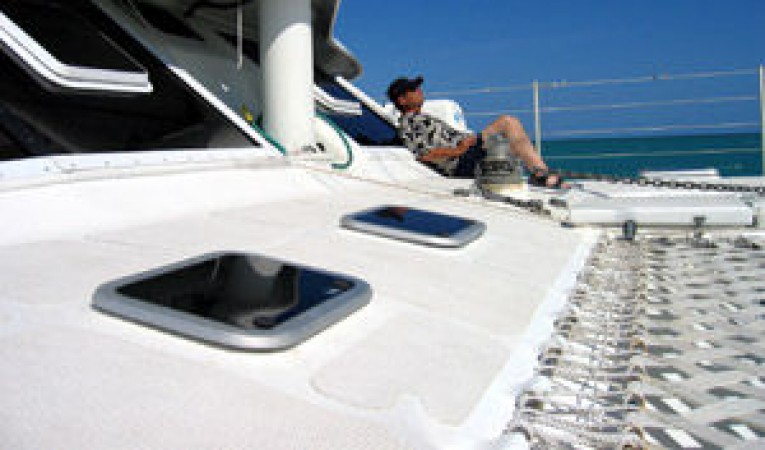 65 Woodwind Kurt Hughes Custom Catamaran Solitude on Forward Deck