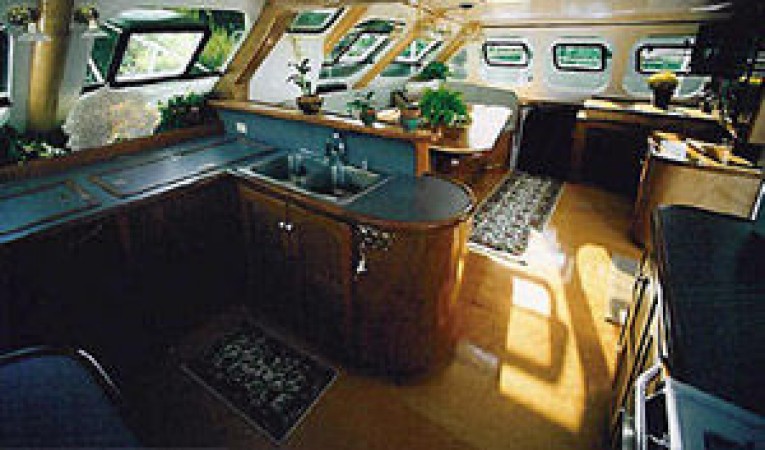 65 Woodwind Kurt Hughes Custom Catamaran Galley/Saloon