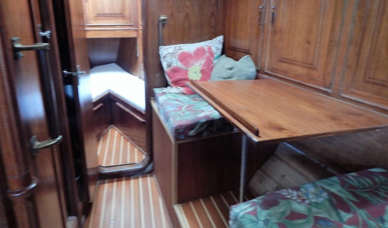 45 Bruce Roberts Dining table - converts to pilot berth