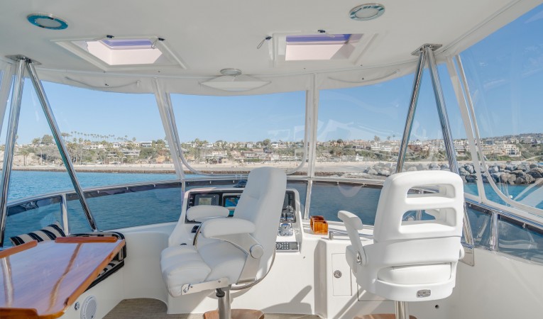 52 Ocean Alexander Flybridge Control Station with Pompanette Captain and Companion Chairs