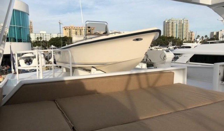 100 Broward Flybridge - aft sun lounge and Tender