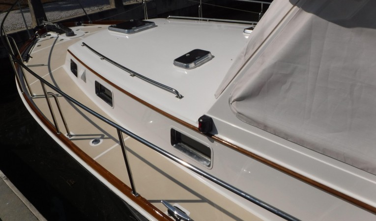 38 Grand Banks All hardware removed and caprail varnished 3/2/16