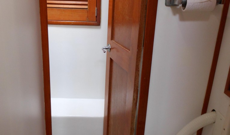 57 Wellington Starboard guest head joins common shower