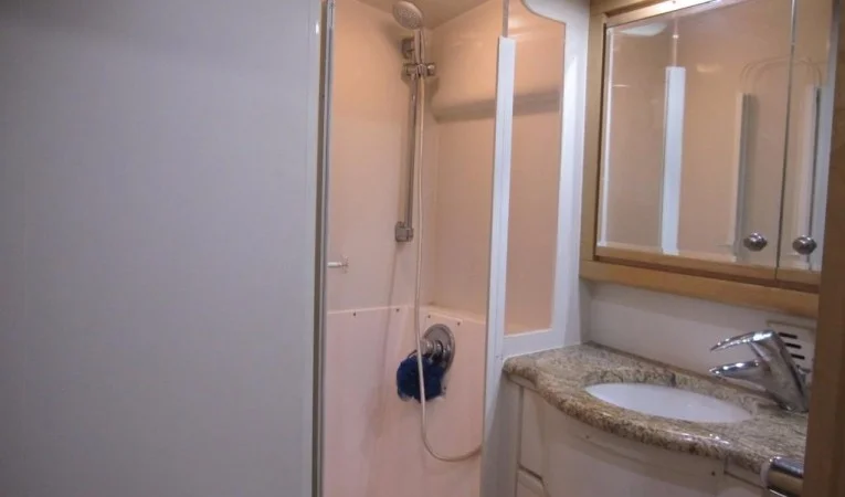 60 Bertram Aft Guest Stateroom En-Suite Head and Day Head