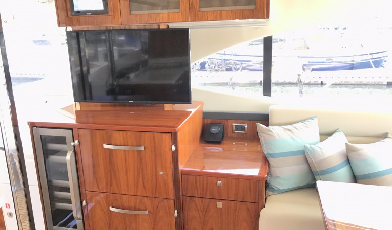 54 Riviera Salon TV, Wine Storage, and refrigerators