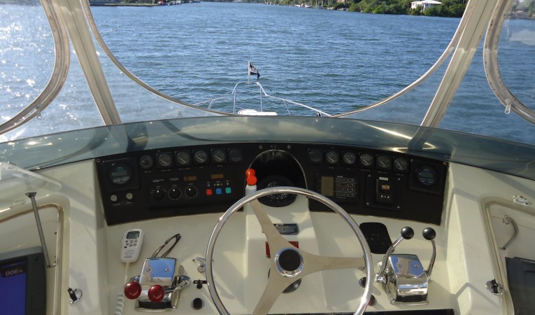 48 Hatteras U-Zip at Helm