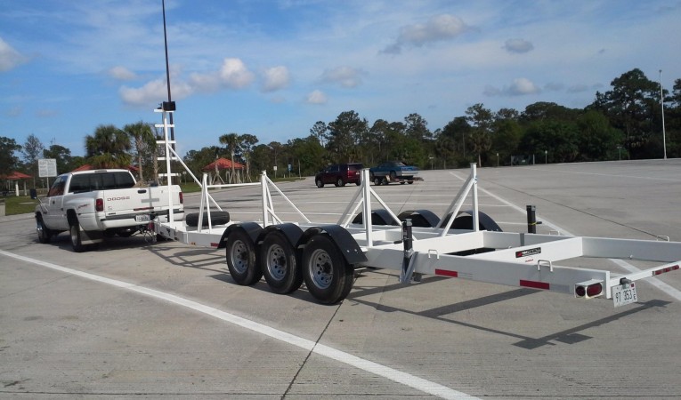 30 Beneteau $12K Aluminum Tri-axle Custom trailer.