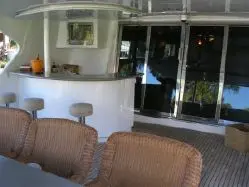 photo of  Azimut Motoryacht (2004 Complete Refit, Luxury Custom Flydeck, 5 SRs +crew)