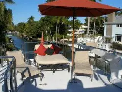 photo of  Azimut Motoryacht (2004 Complete Refit, Luxury Custom Flydeck, 5 SRs +crew)