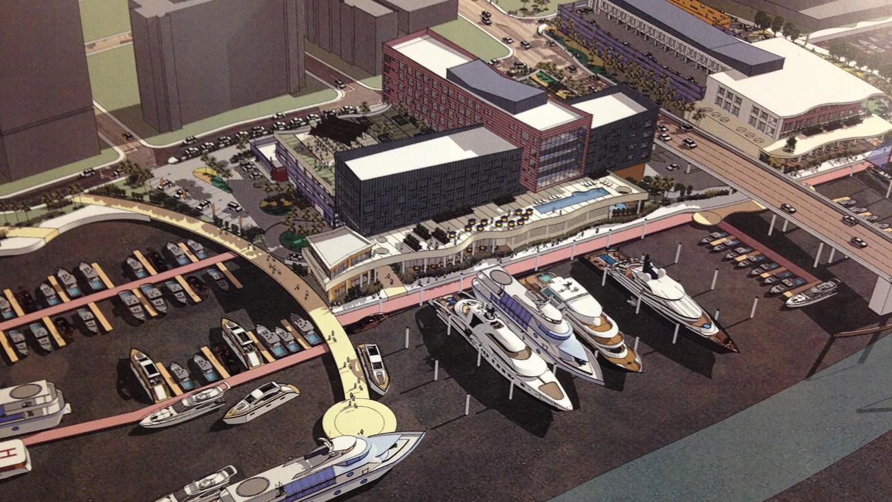 A conceptual view of making the Las Olas Marina into a resort hotel and expanded marina. The rendering show the hotel next to the marina on the north side of Las Olas Boulevard, with a restaurant, office and parking complex on the south side of Las Olas, to the right.