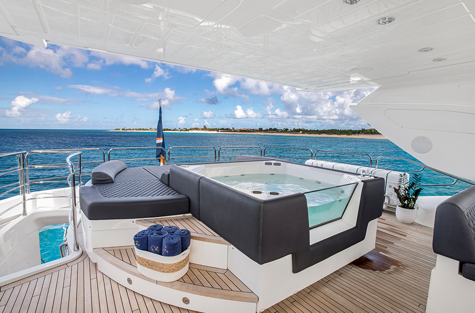 Jacuzzi, bar, dining table and retractable hard top on sundeck